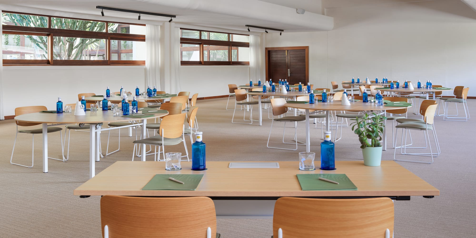 a room with tables and chairs