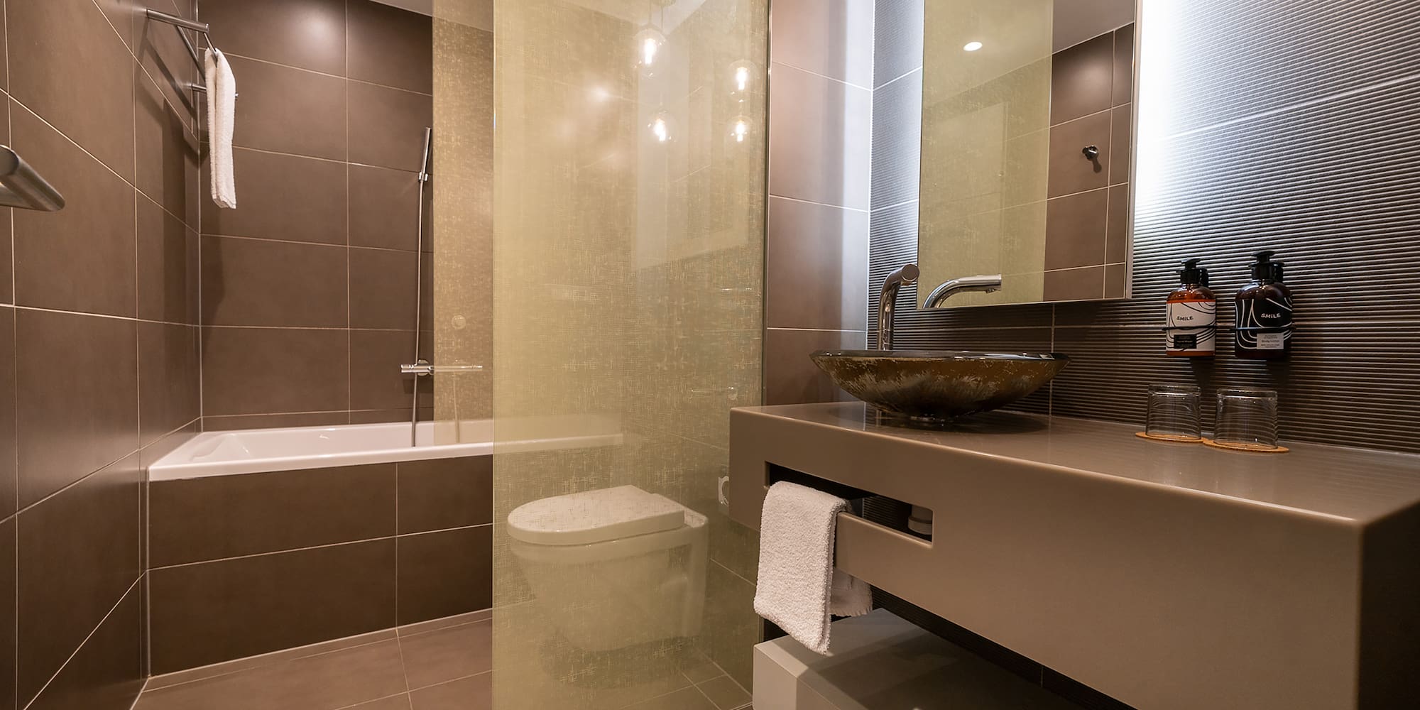 a bathroom with a sink and a shower