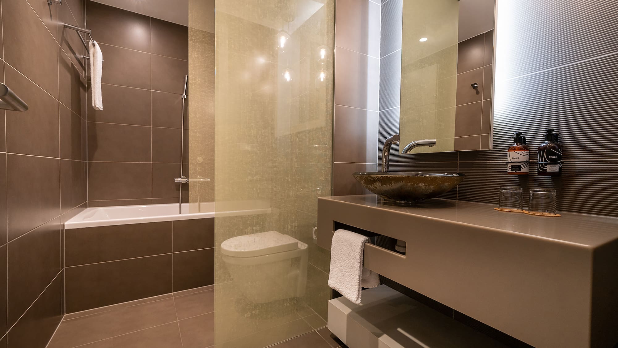 a bathroom with a sink and a shower