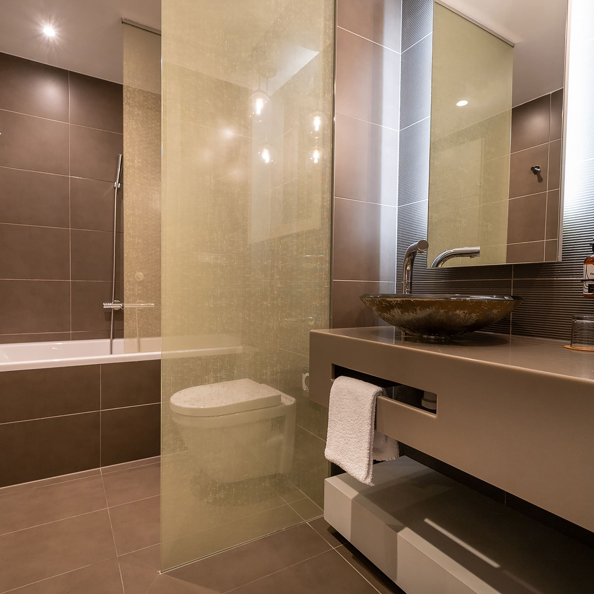 a bathroom with a sink and a shower