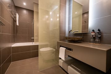 a bathroom with a sink and a shower