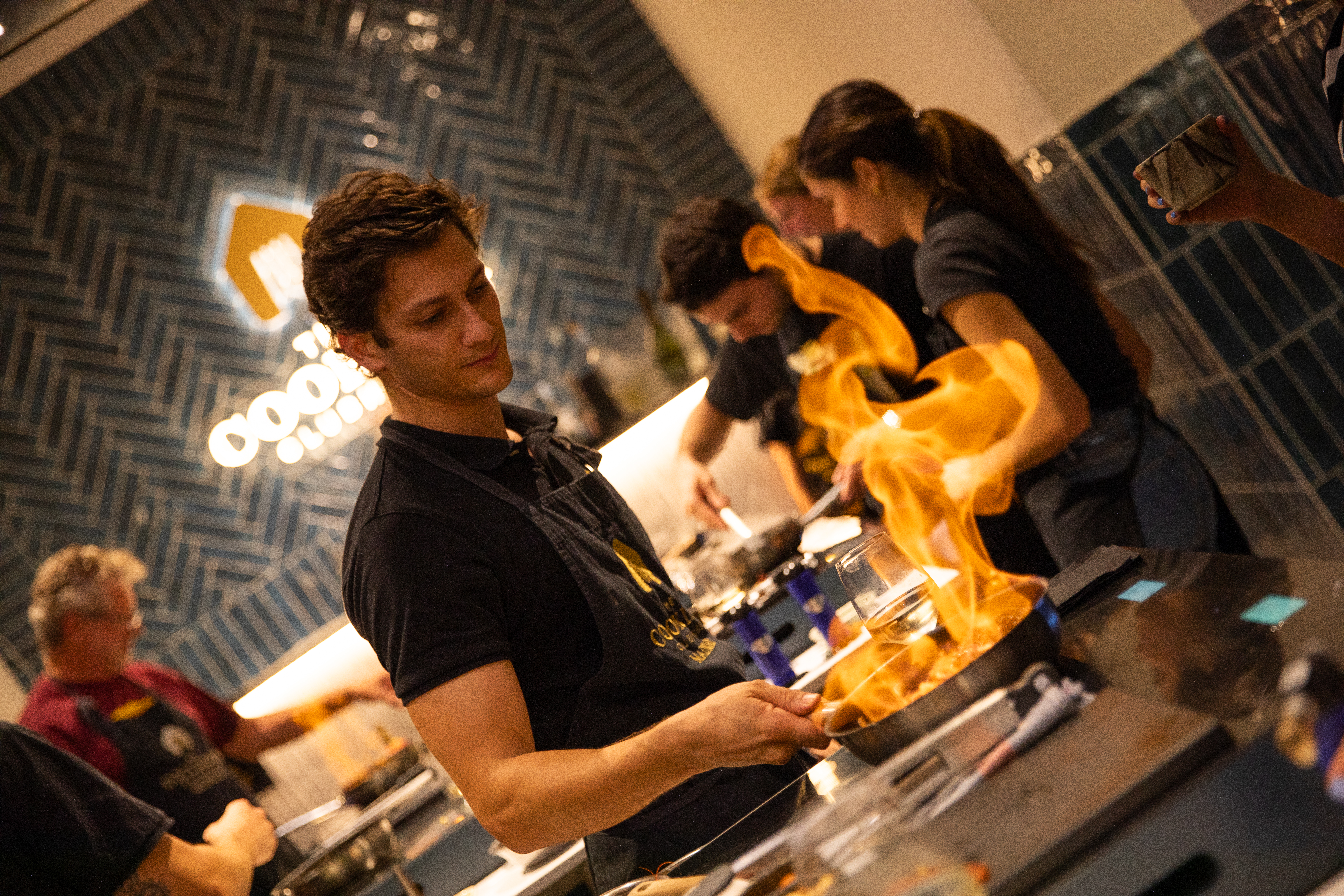 a man cooking in a kitchen