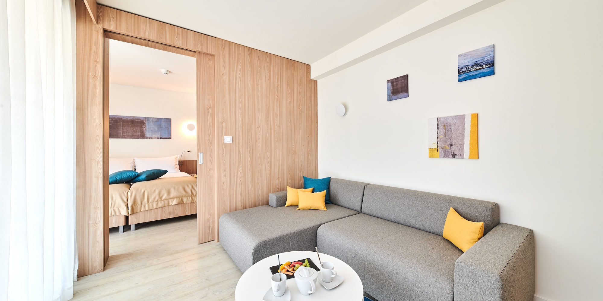 a living room with a couch and a small table