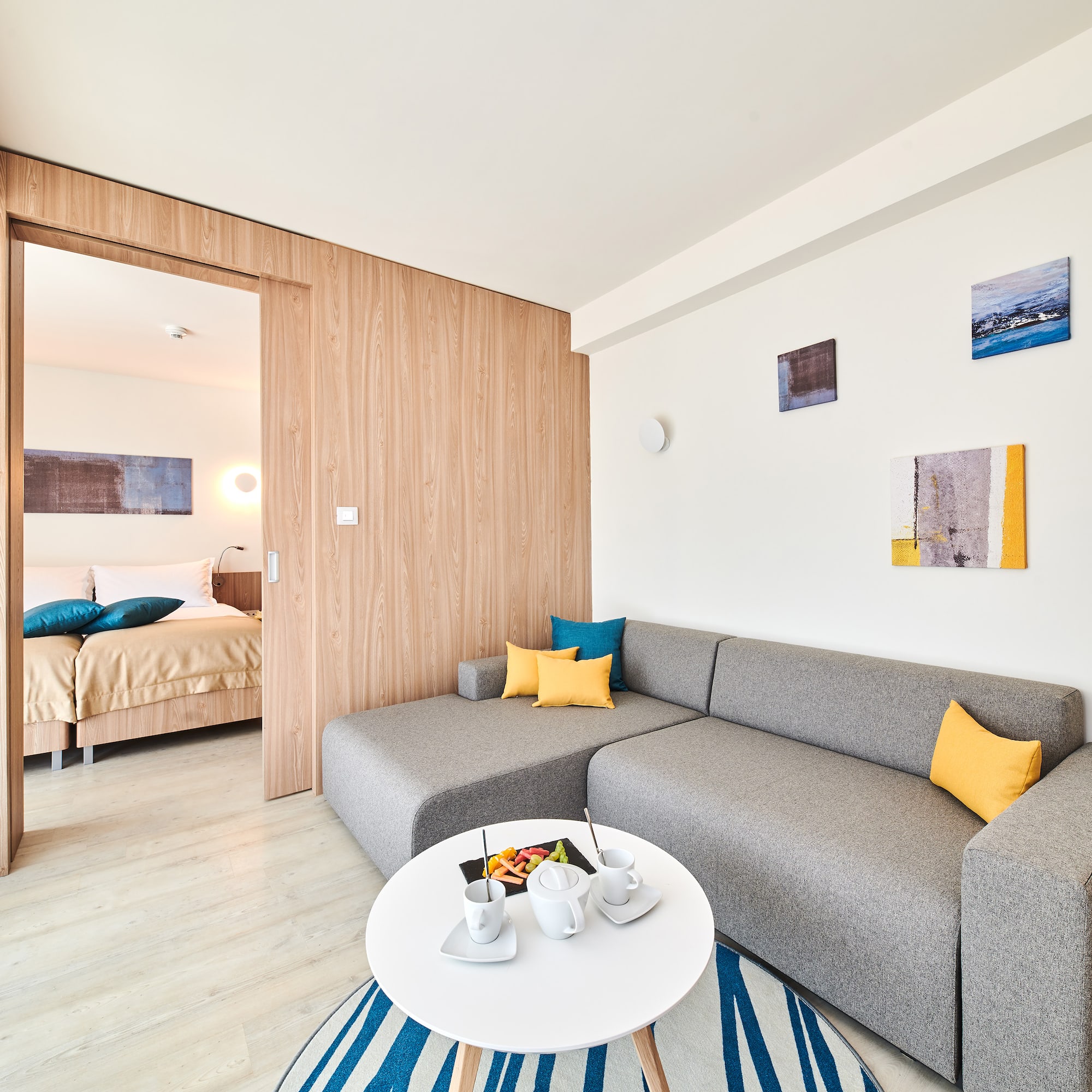 a living room with a couch and a small table