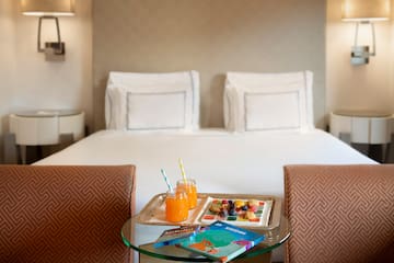 a tray of food on a table in a hotel room