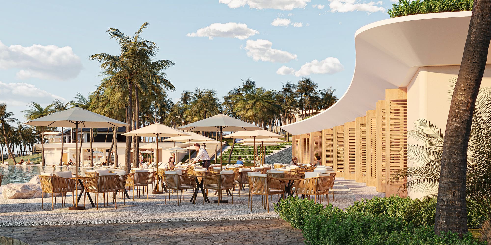 Terraza de restaurante moderno al aire libre en resort tropical con palmeras y piscina.