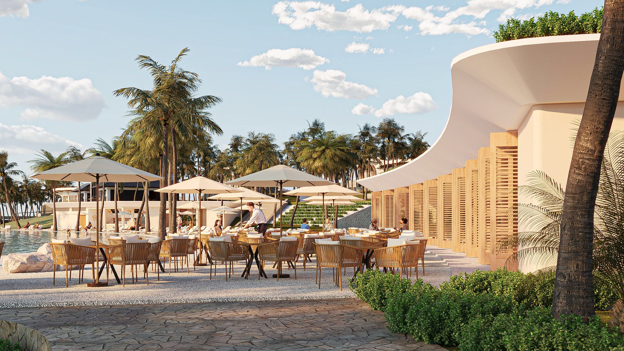 Tropical resort outdoor dining with tables, umbrellas, palm trees, and poolside view.