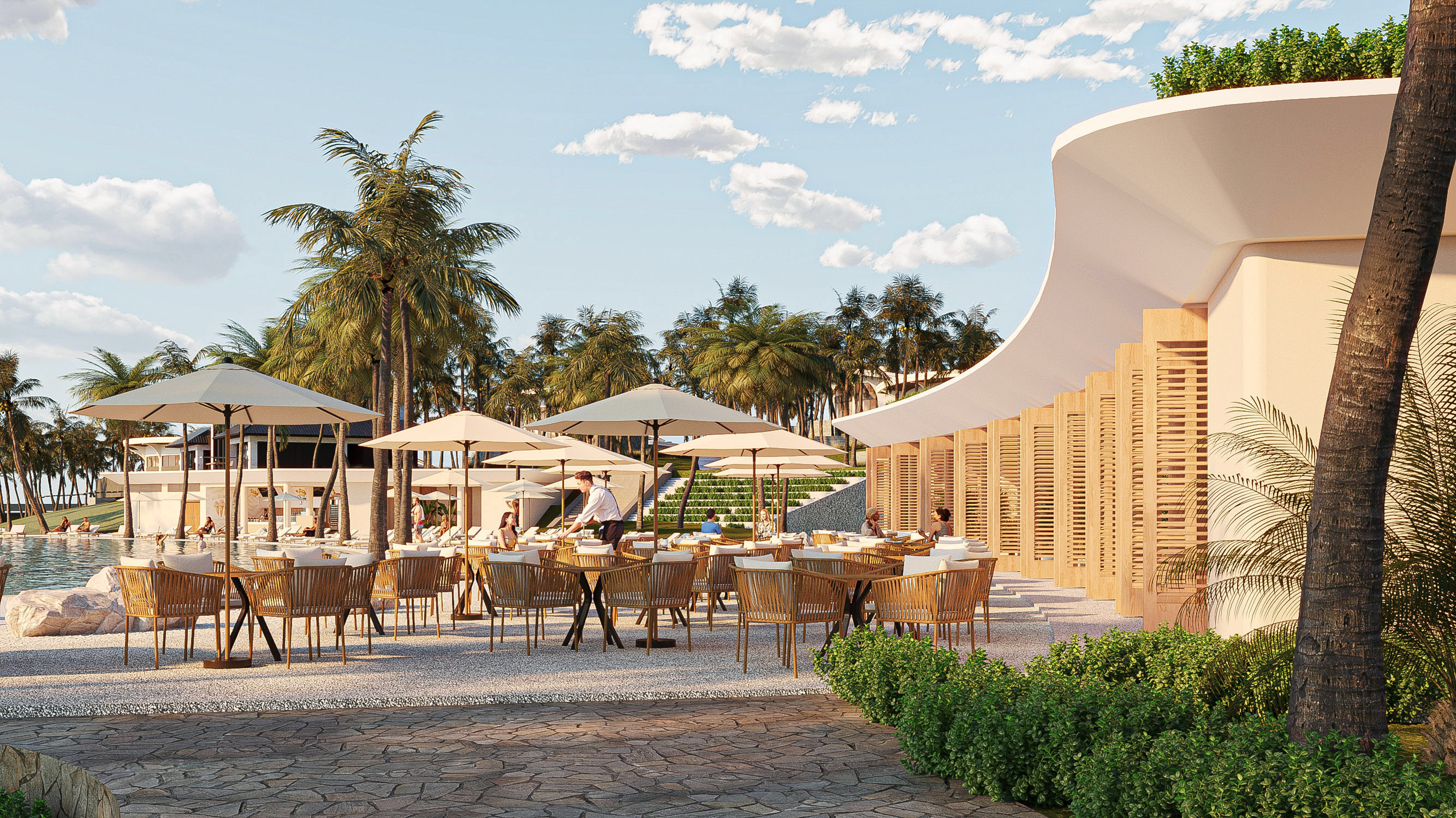 Tropical resort outdoor dining with tables, umbrellas, palm trees, and poolside view.
