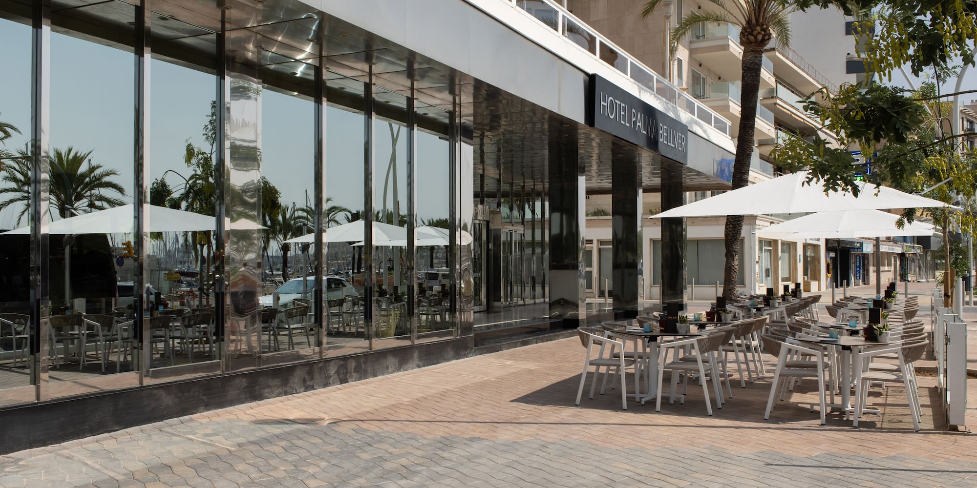 a building with tables and chairs outside