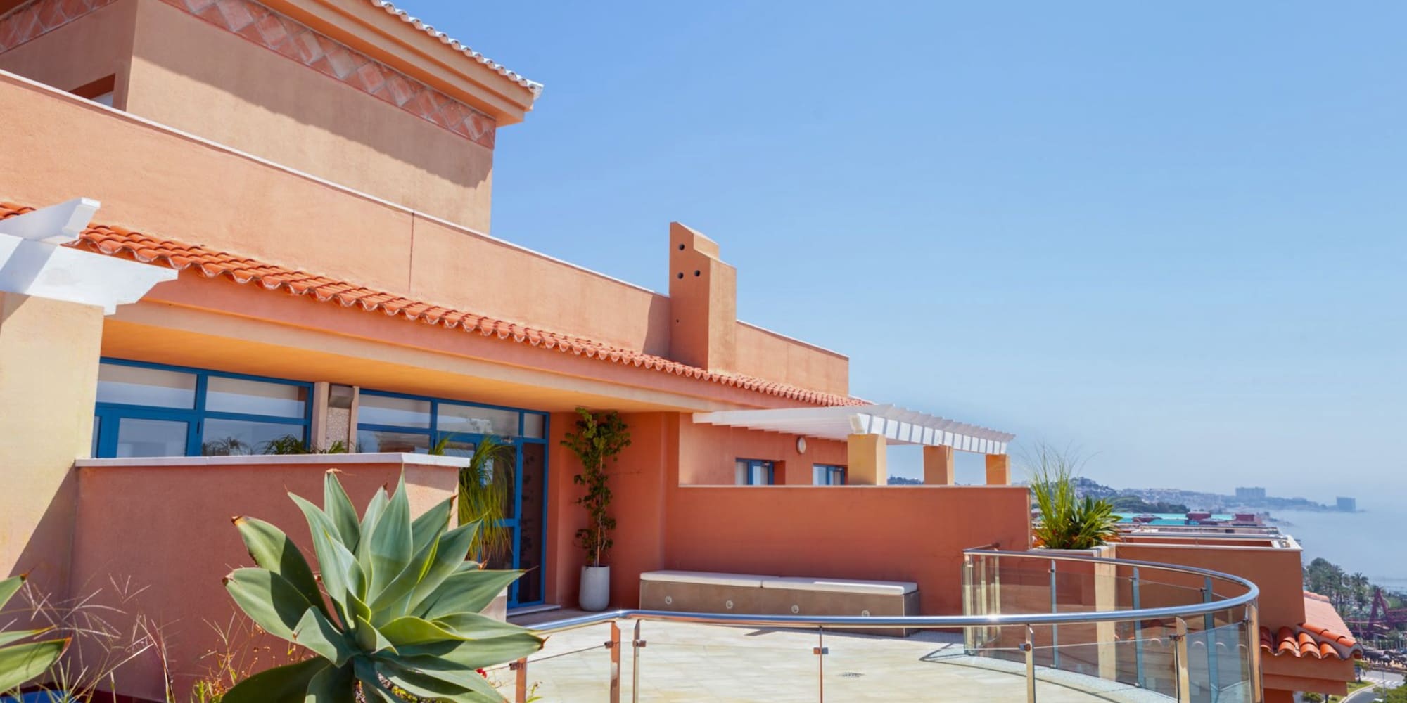 a building with a glass railing