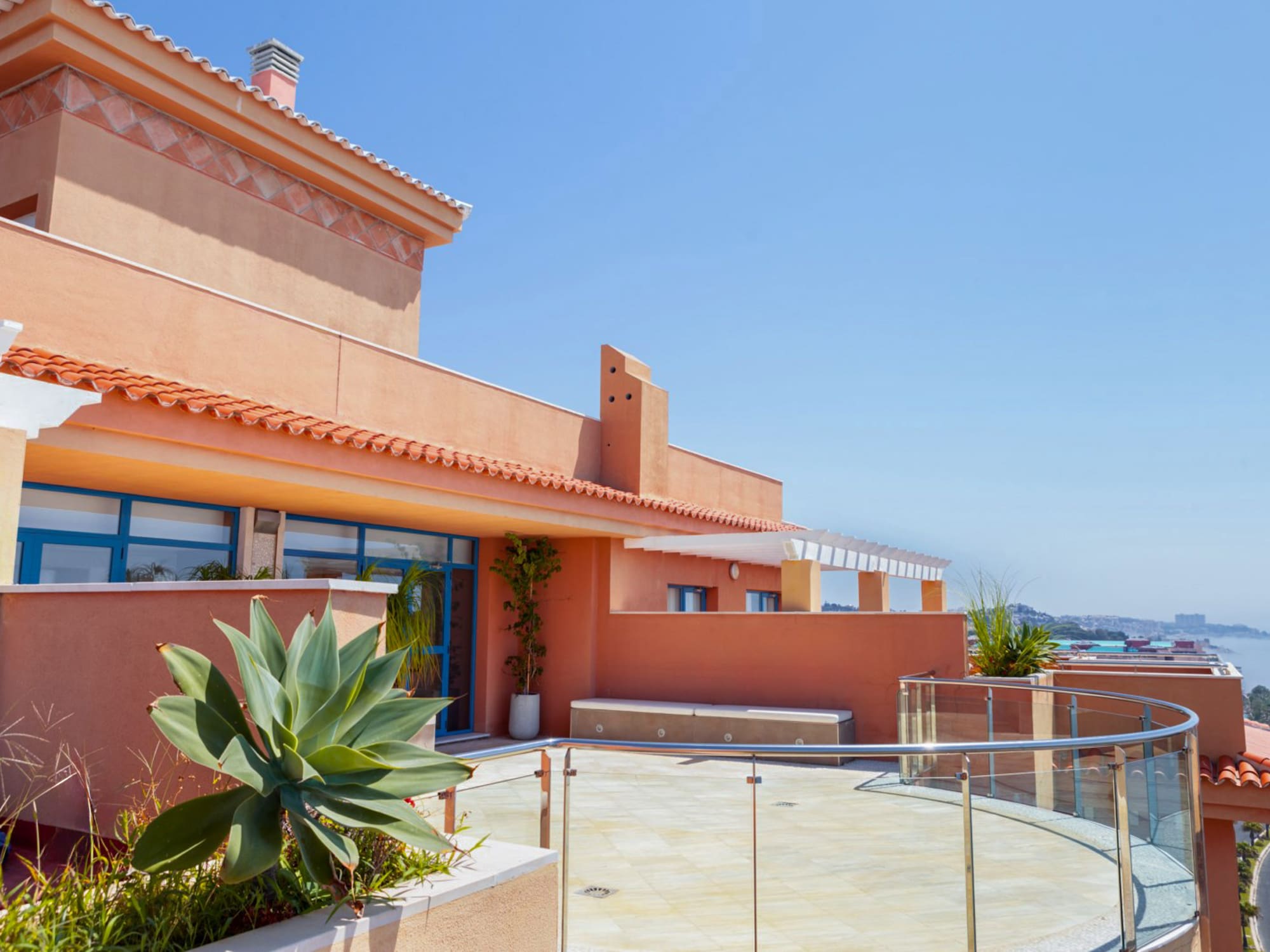 a building with a glass railing