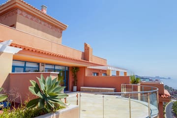 a building with a glass railing