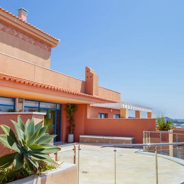 a building with a glass railing