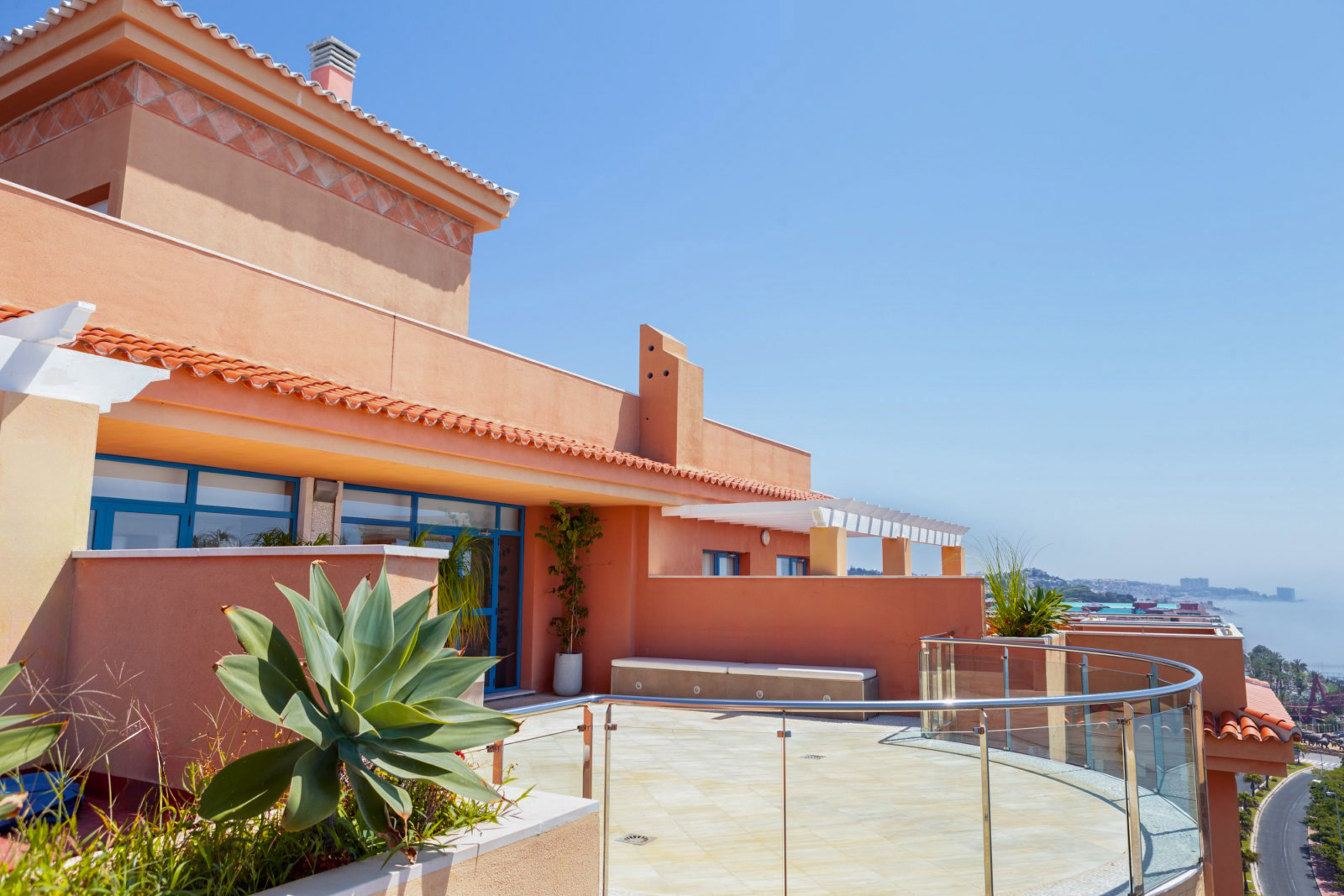 a building with a glass railing