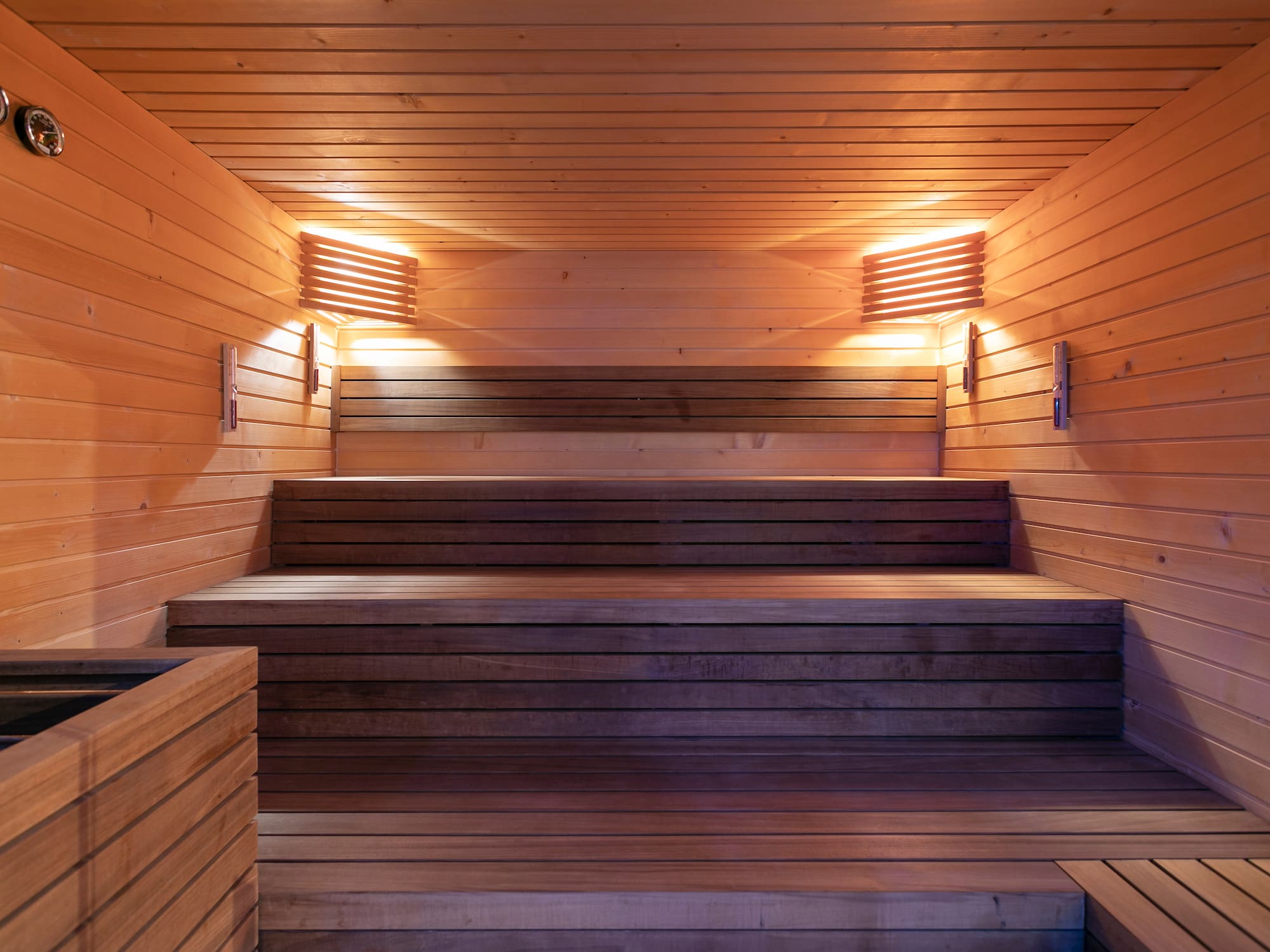 a wooden sauna with lights