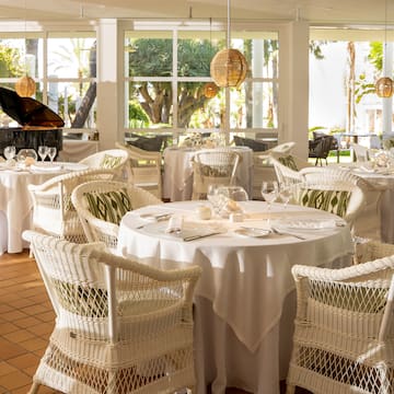 a room with tables and chairs