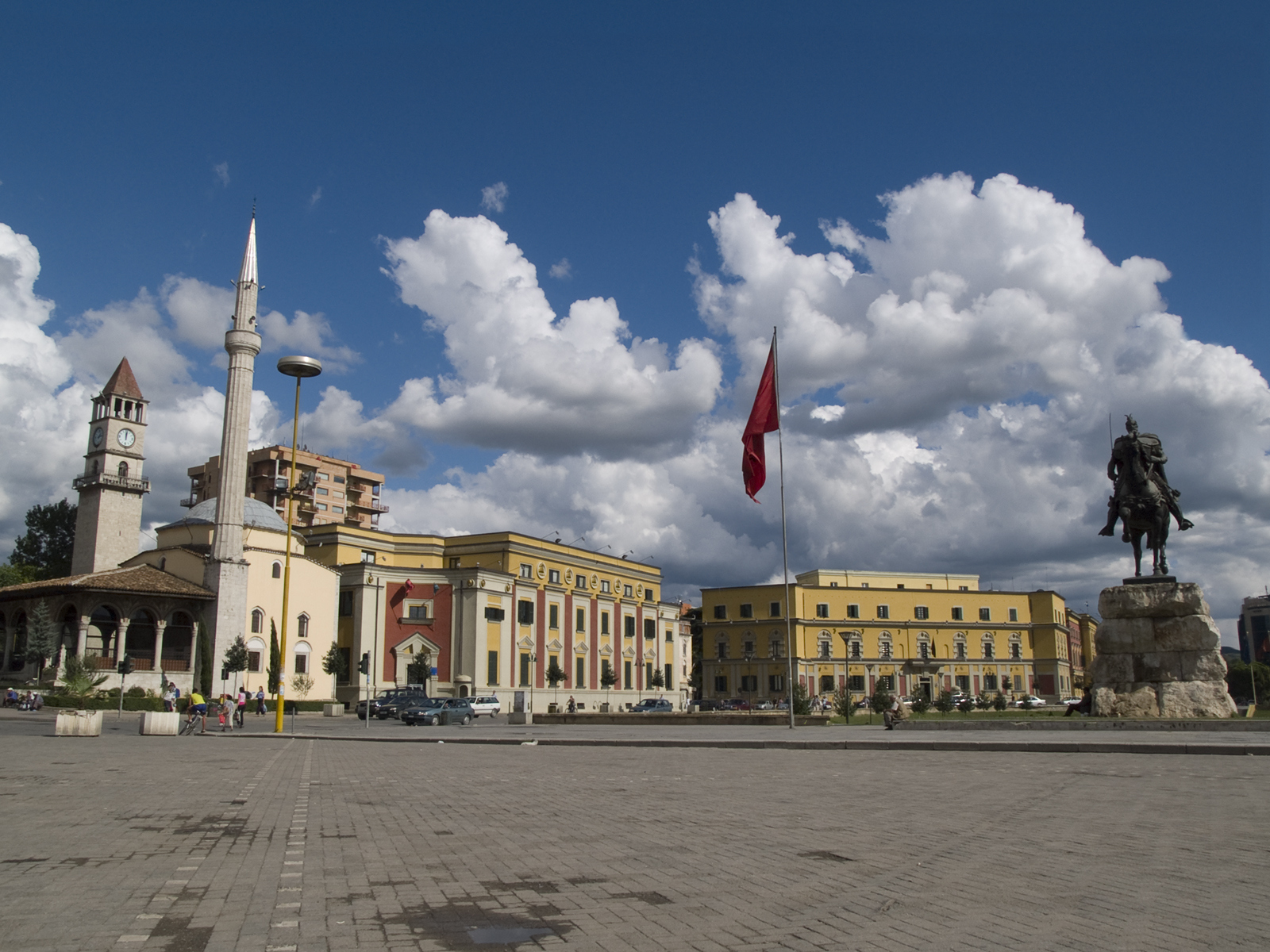 a building with a flag on the pole