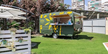 a food truck on grass