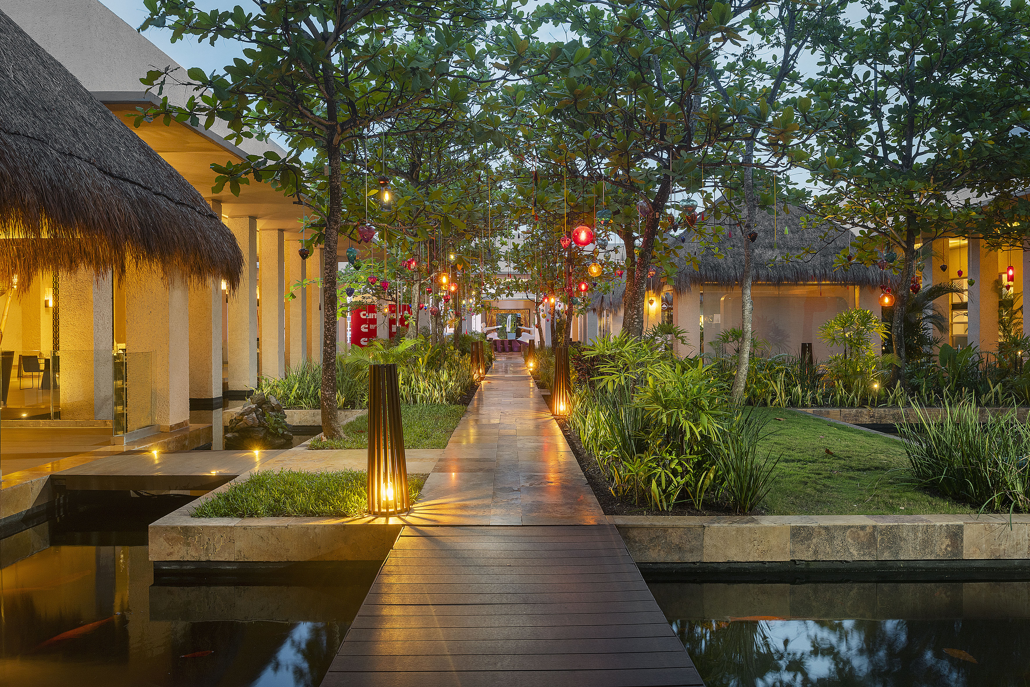 a walkway with lights on it