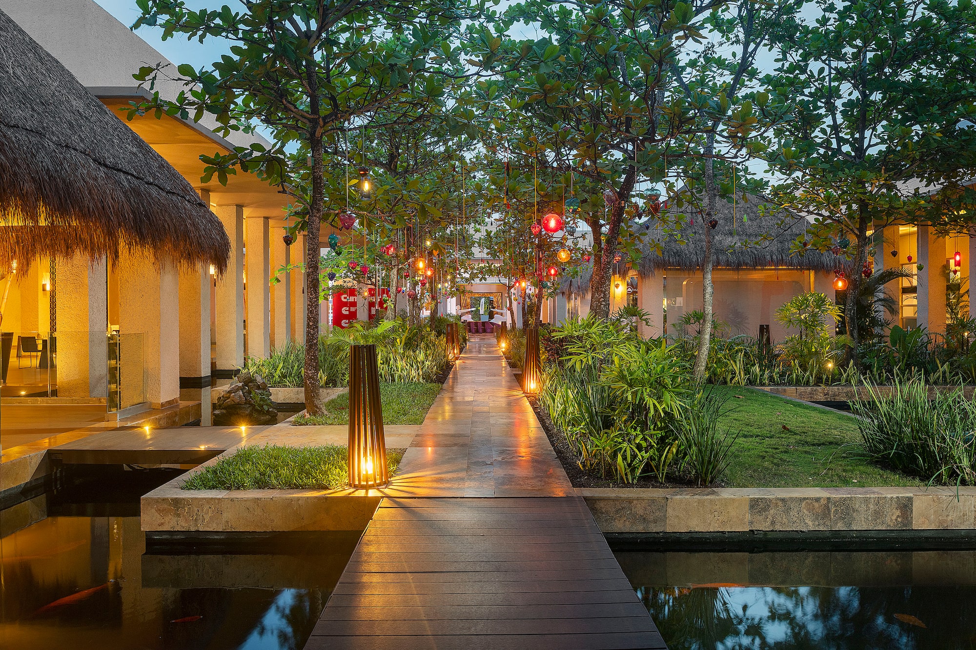 a walkway with lights on it