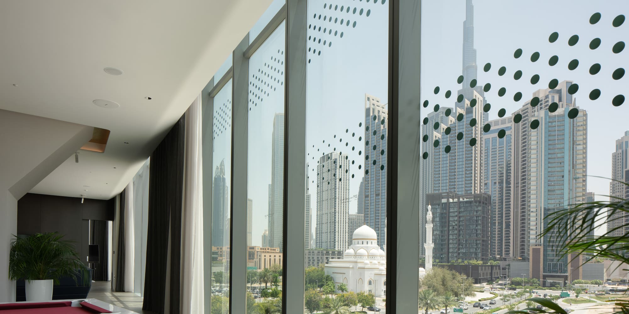 a large window with a view of a city