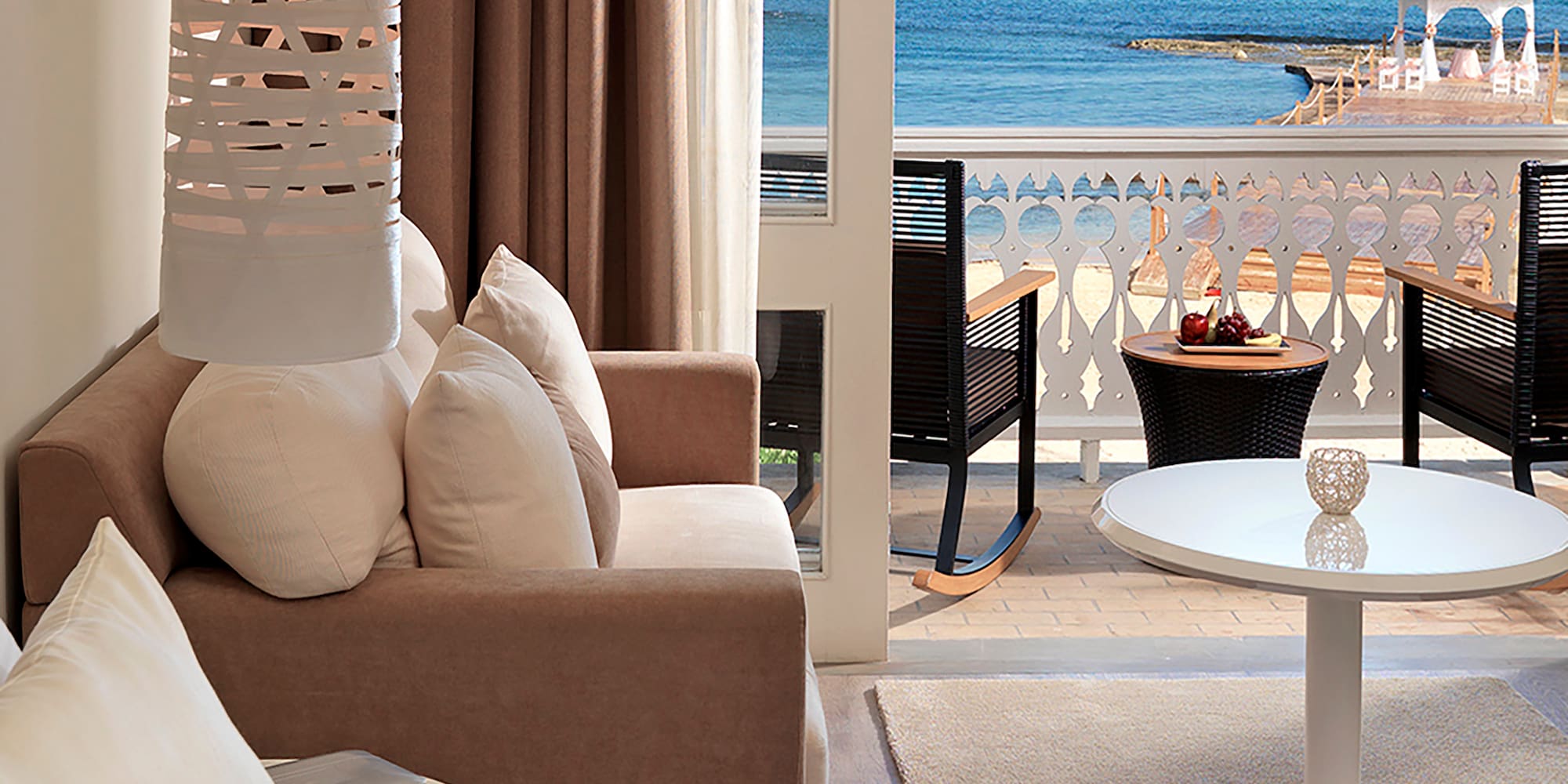 a room with a view of the ocean