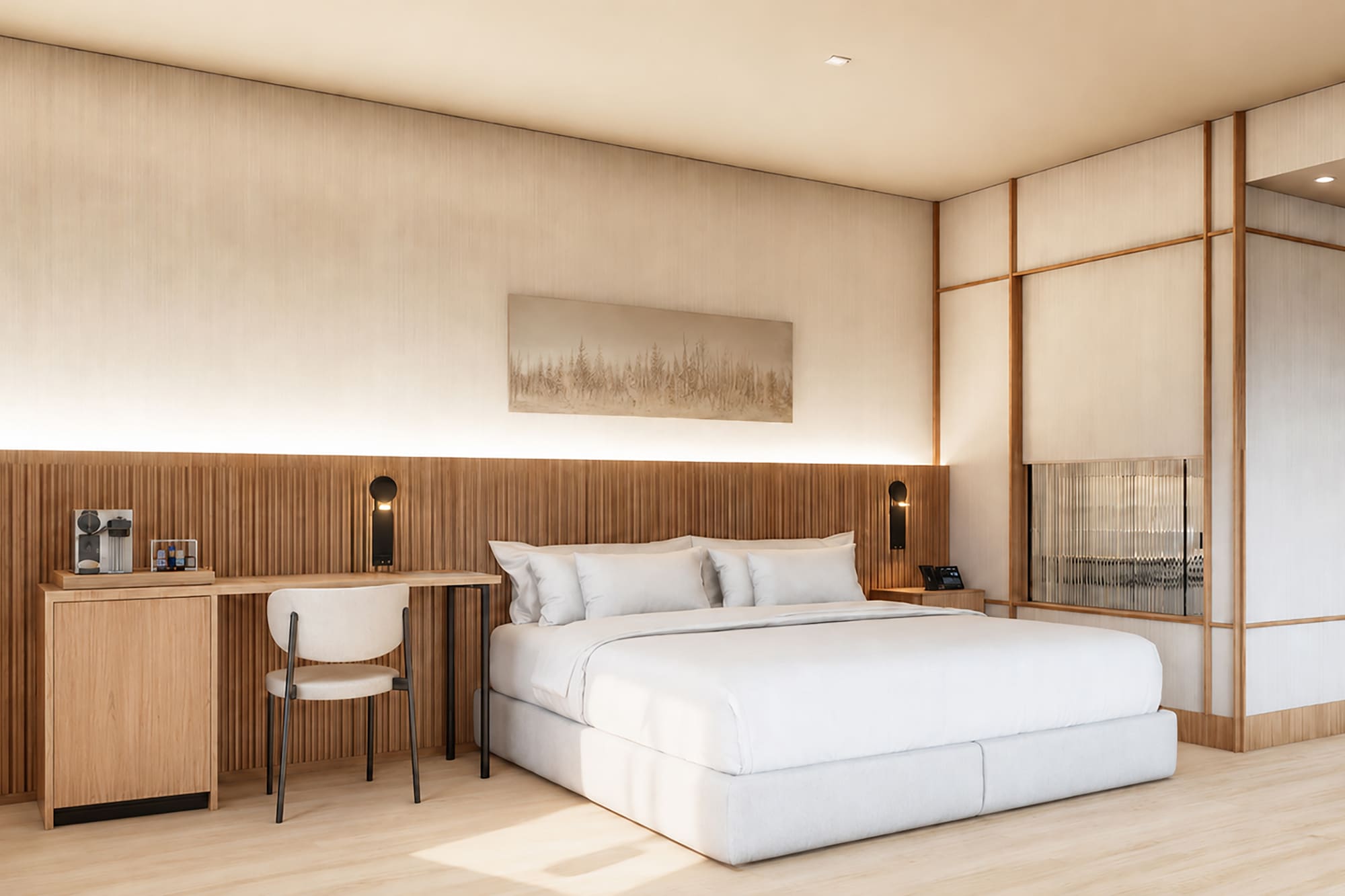 Habitación hotel moderna: cama, escritorio, cabecero y acabados en madera clara.