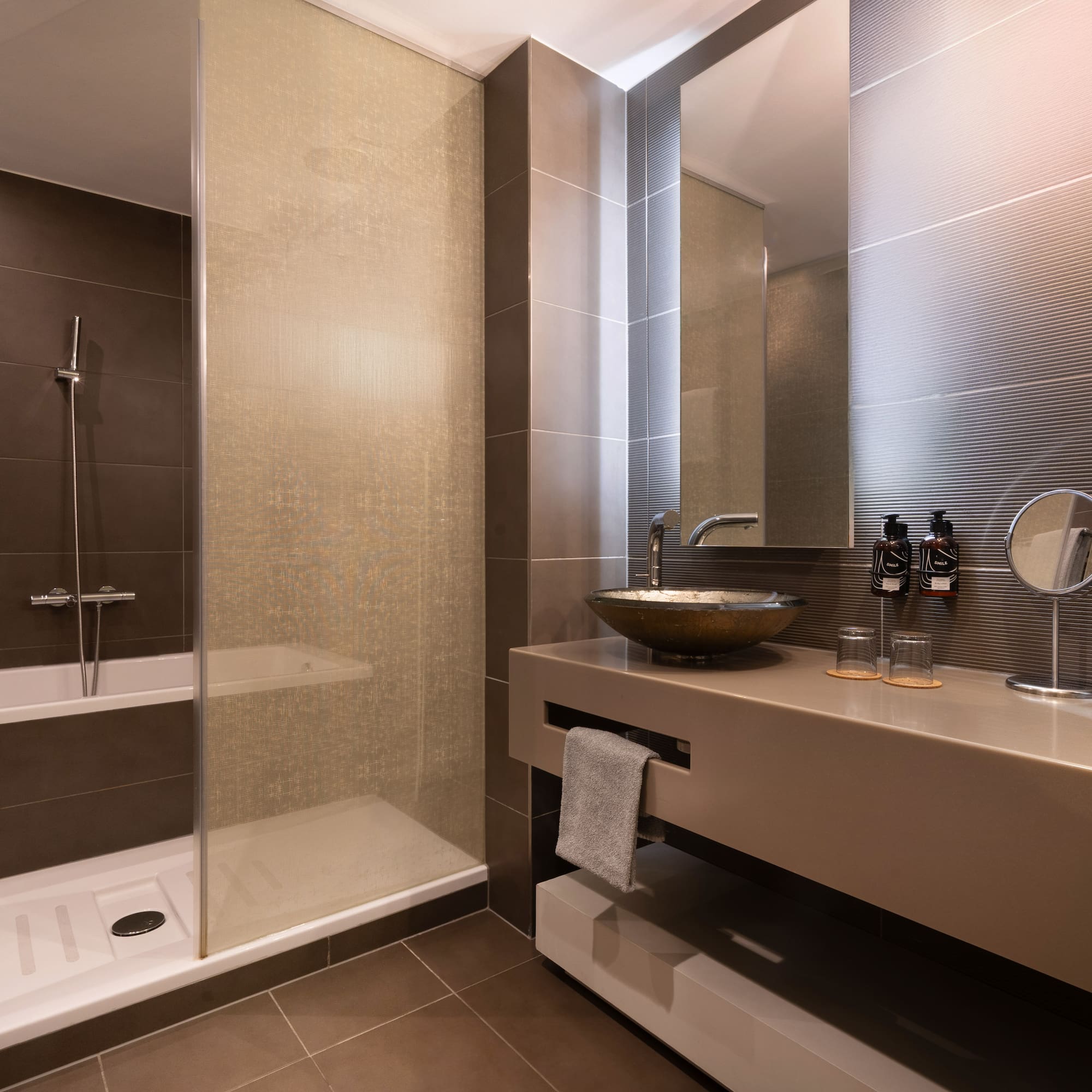 a bathroom with a sink and shower