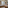 a bathroom with marble tiles and sinks