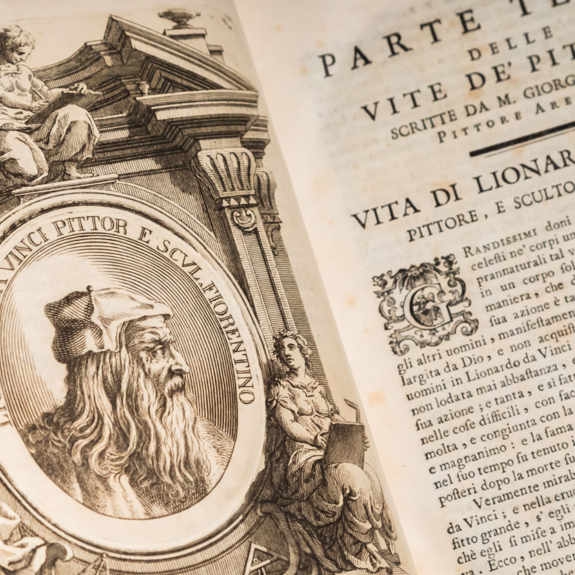 an open book with a picture of a man