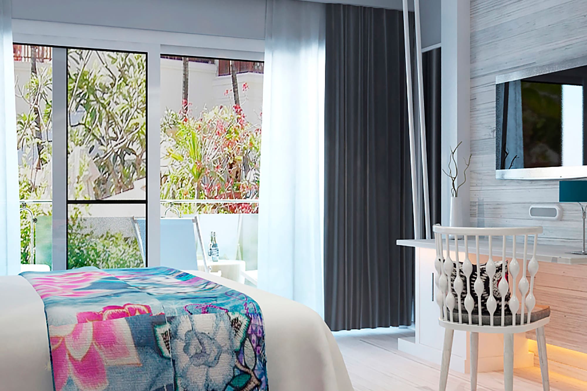 a bedroom with a bed and a television