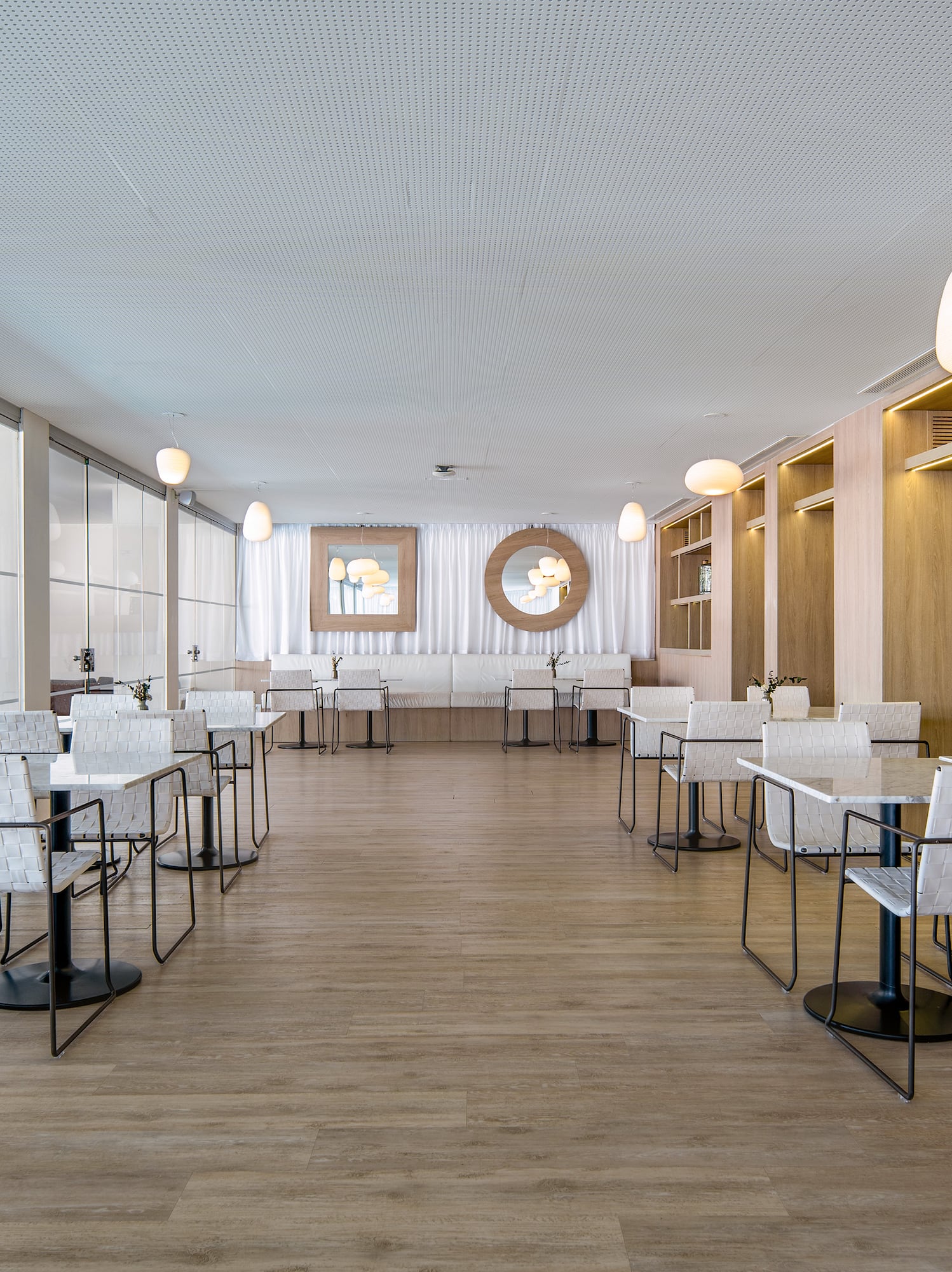 a room with tables and chairs