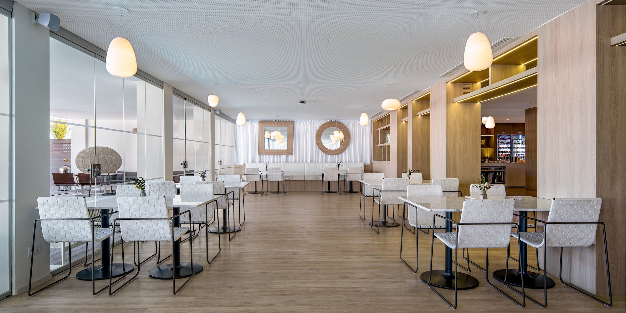 a room with tables and chairs