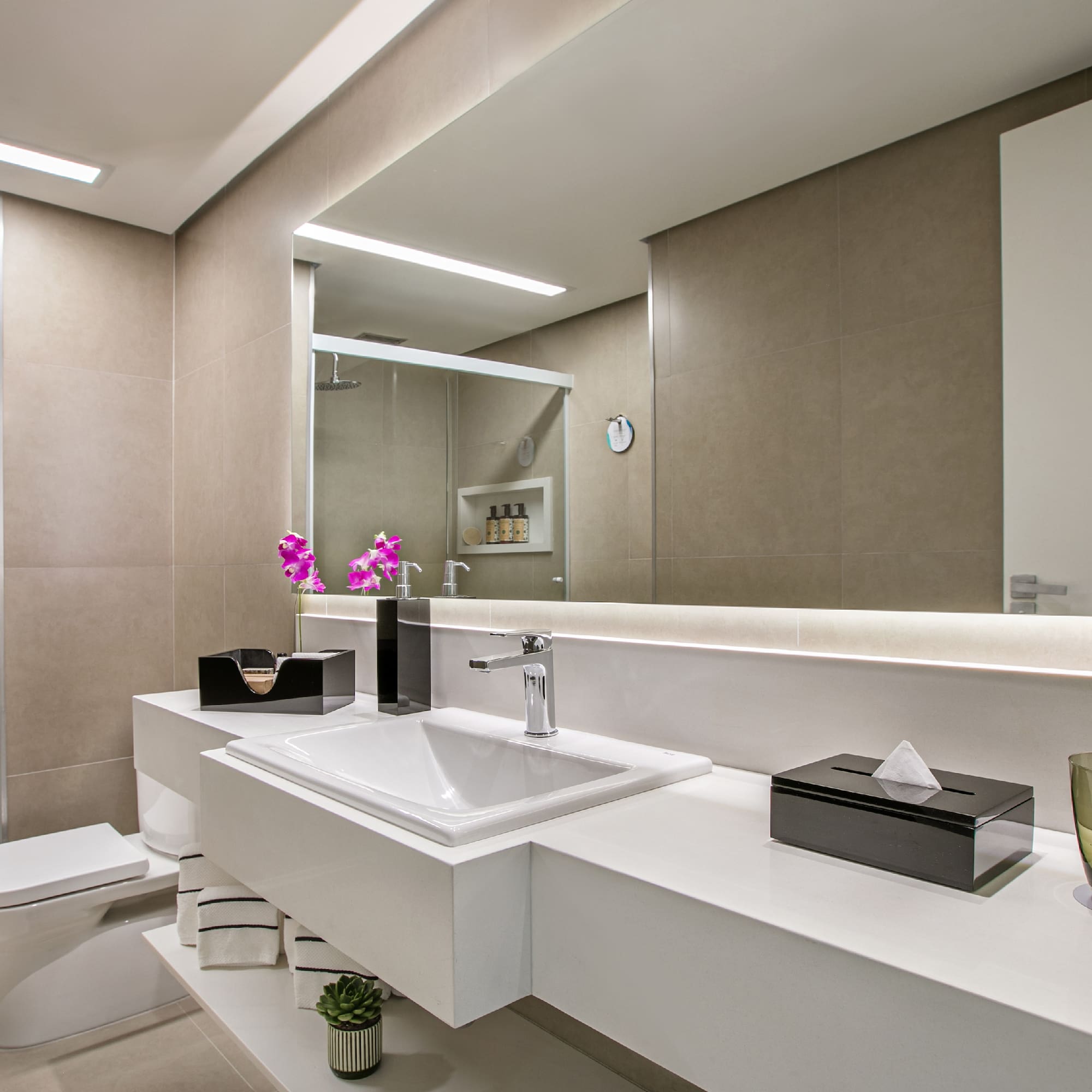 a bathroom with a sink and a toilet