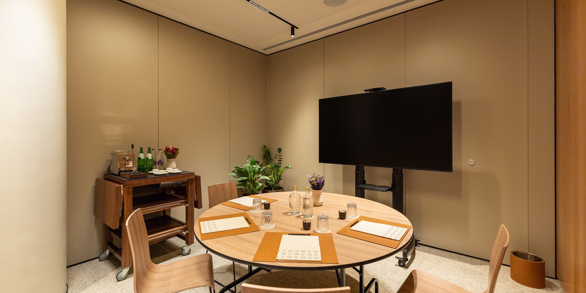 a room with a table and chairs