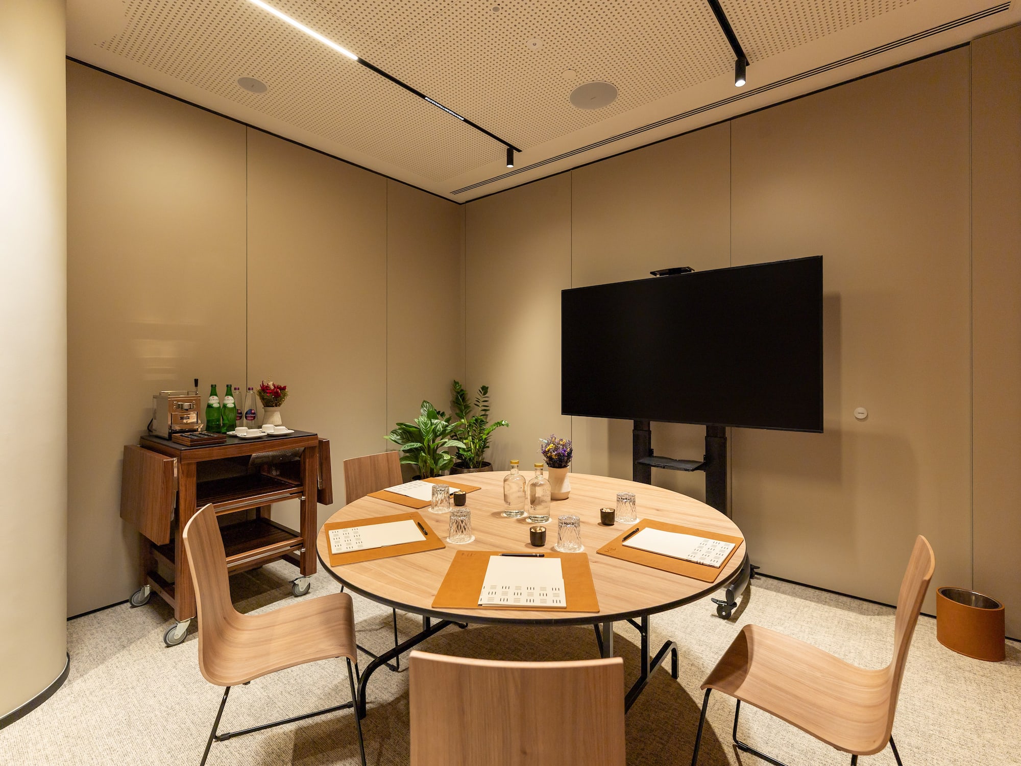 a room with a table and chairs