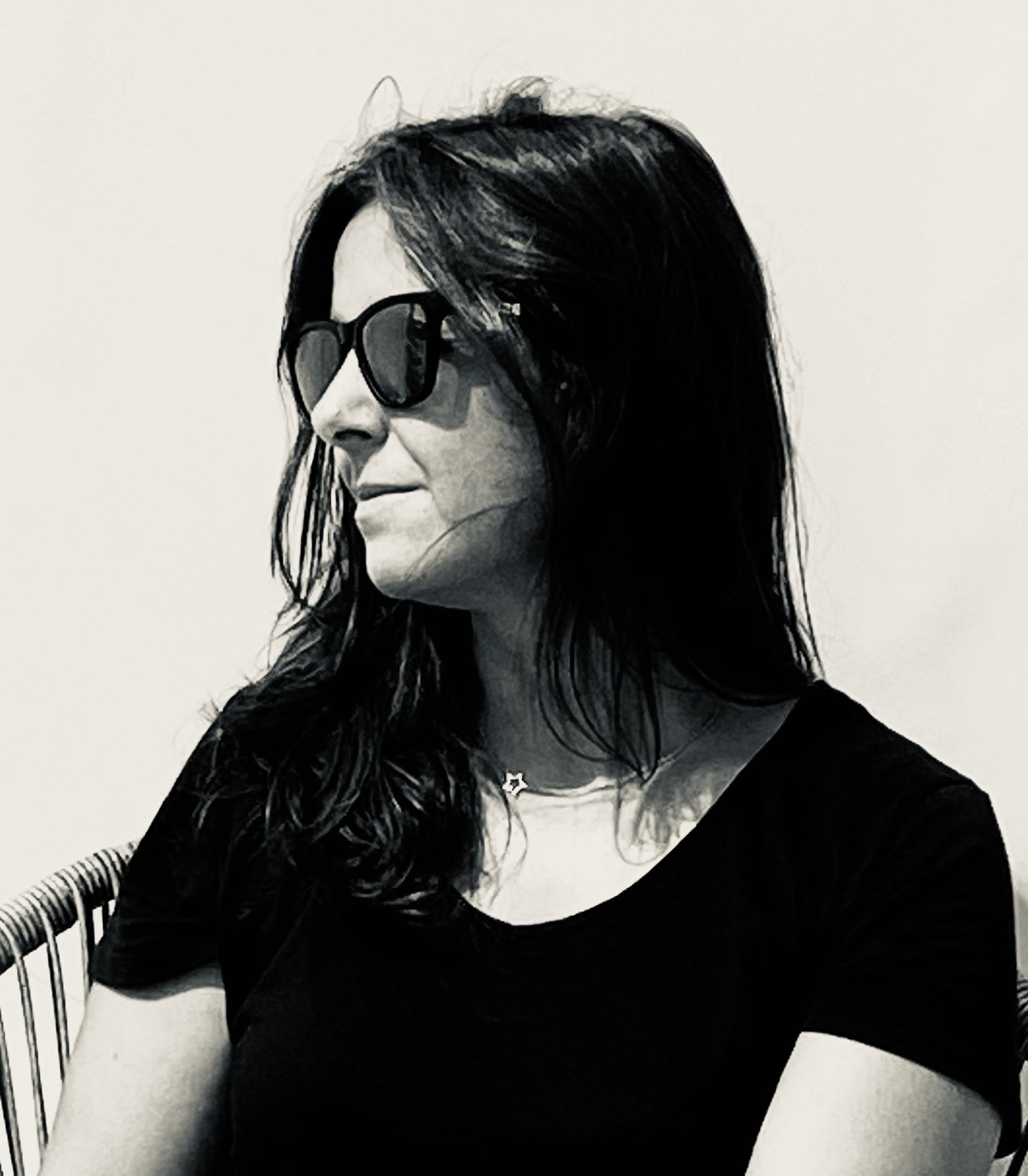 a woman wearing sunglasses