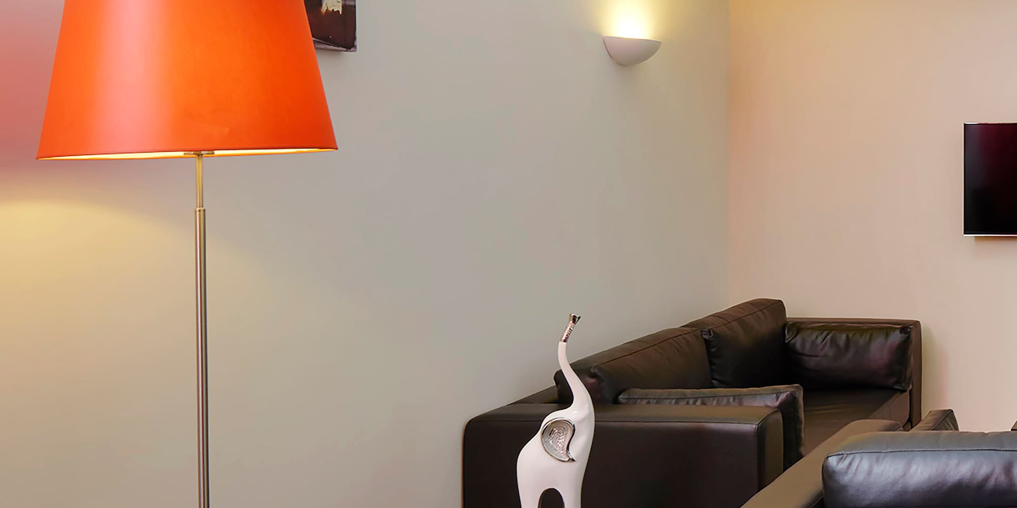 a room with a table and a lamp