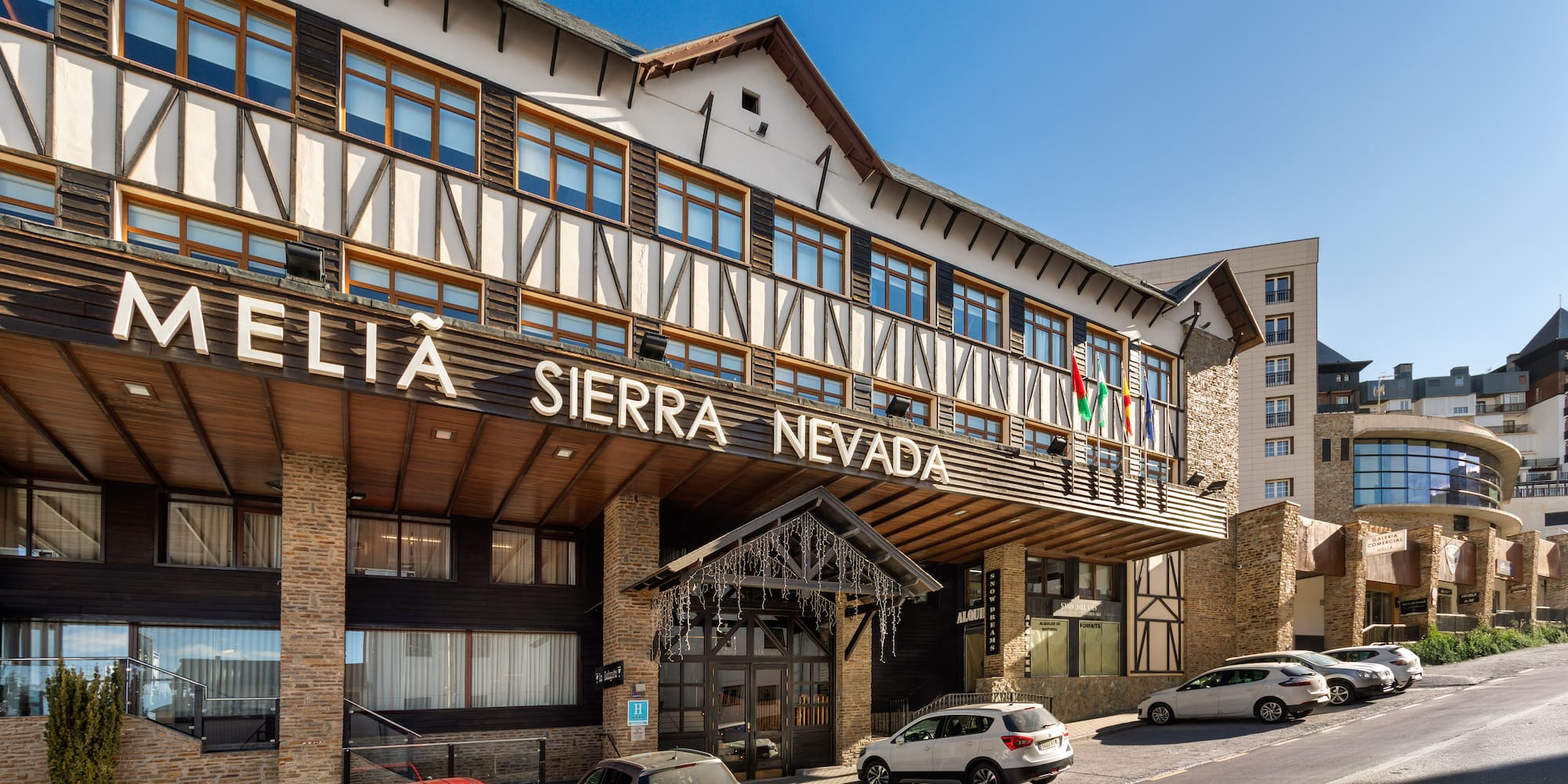 a building with cars parked in front of it
