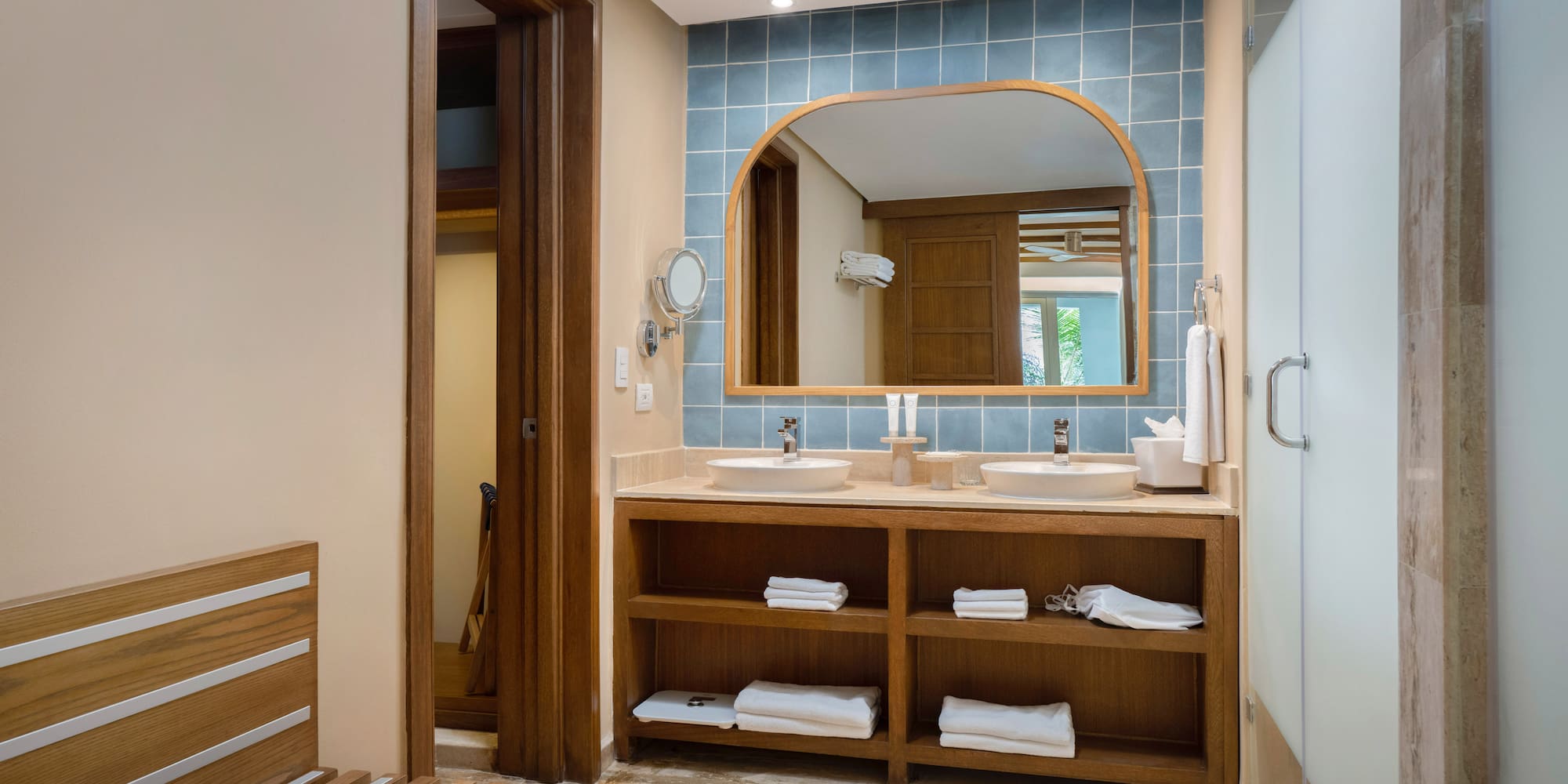a bathroom with a mirror and sink