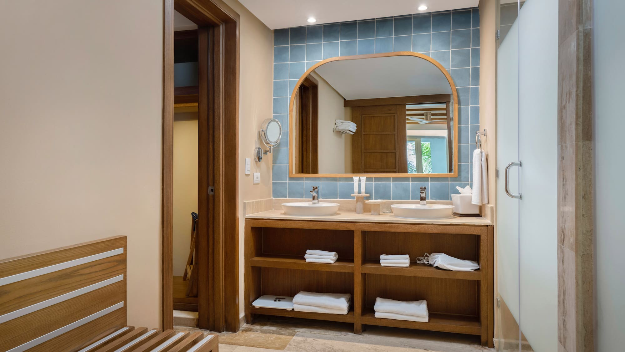 a bathroom with a mirror and sink