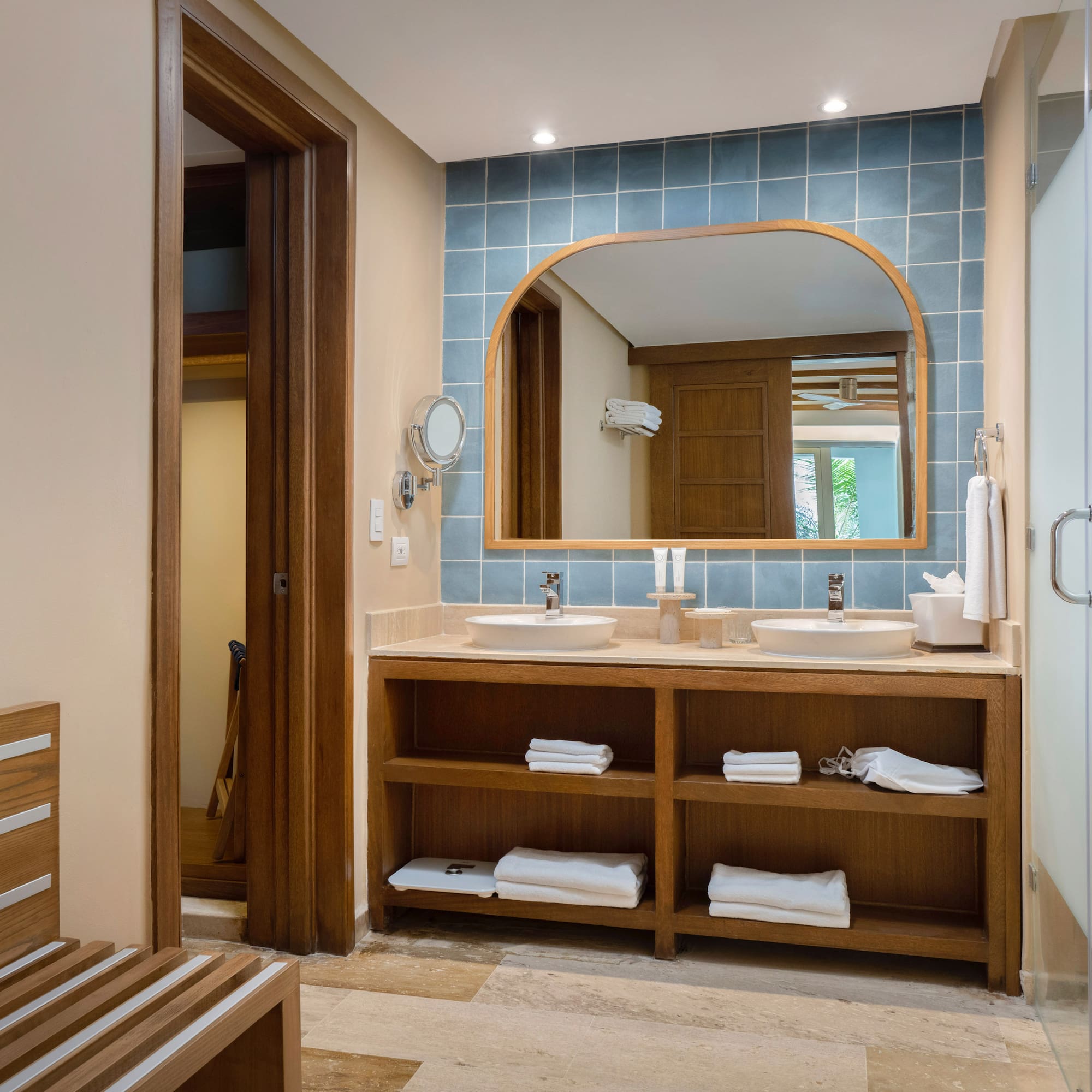 a bathroom with a mirror and sink