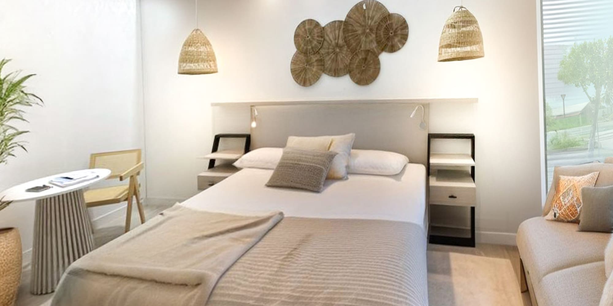 a bedroom with a bed and a fan