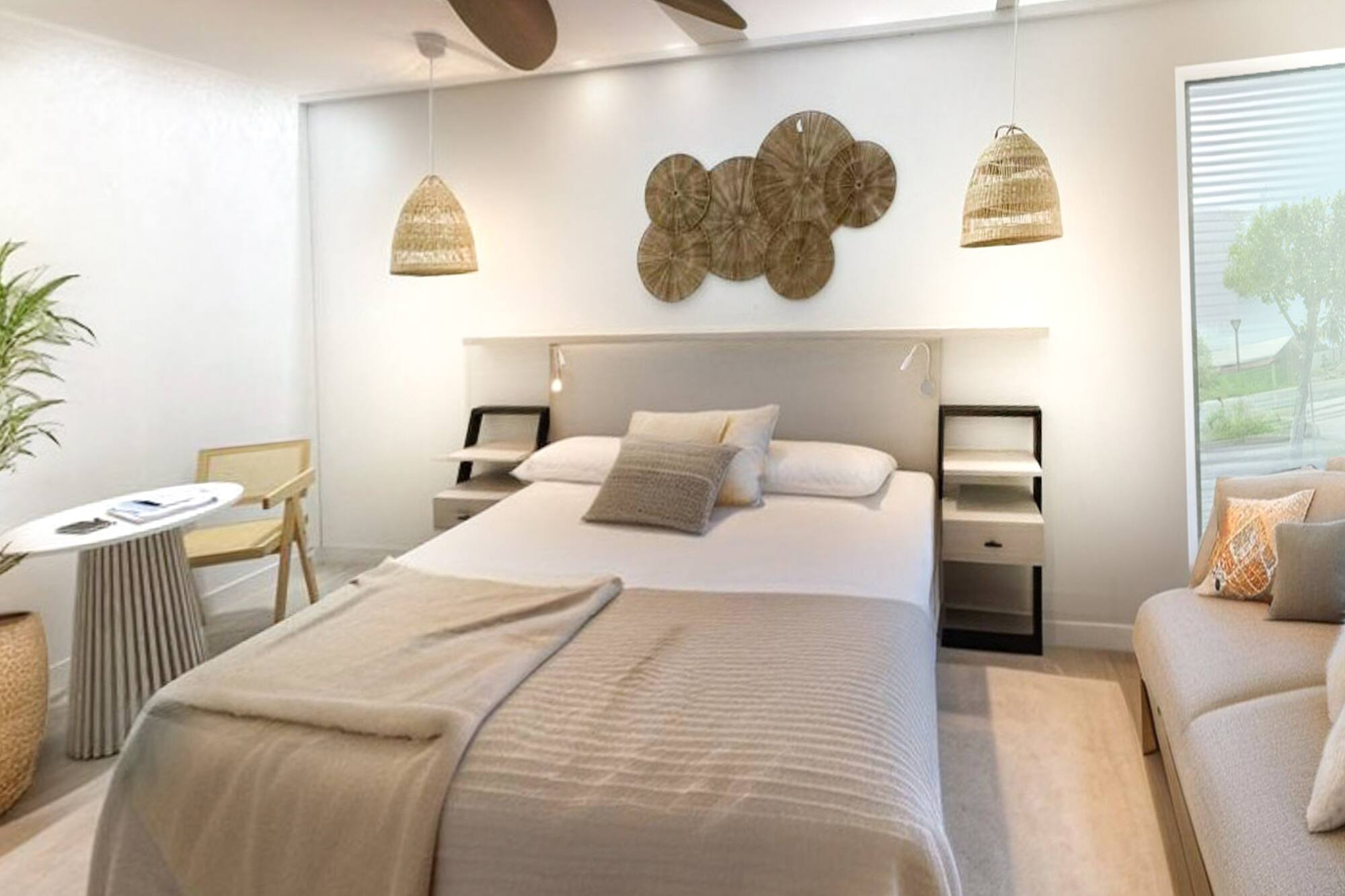 a bedroom with a bed and a fan