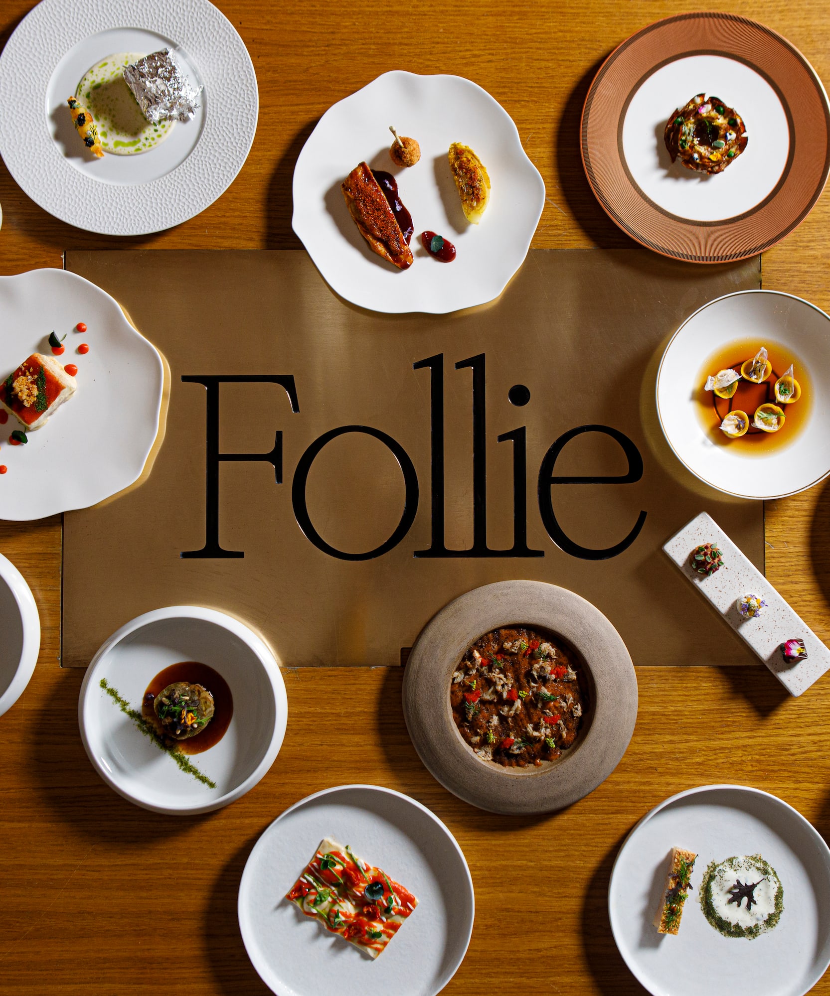 a group of plates of food on a table