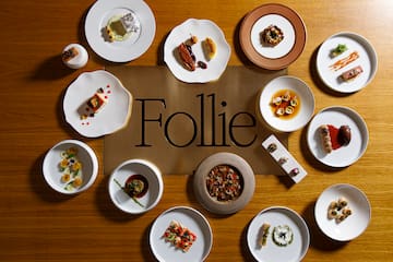 a group of plates of food on a table