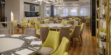 a room with tables and chairs