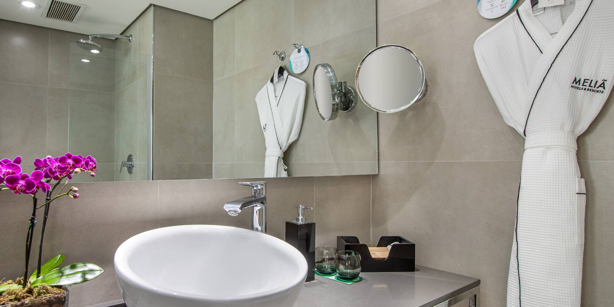 a bathroom with a sink and towels