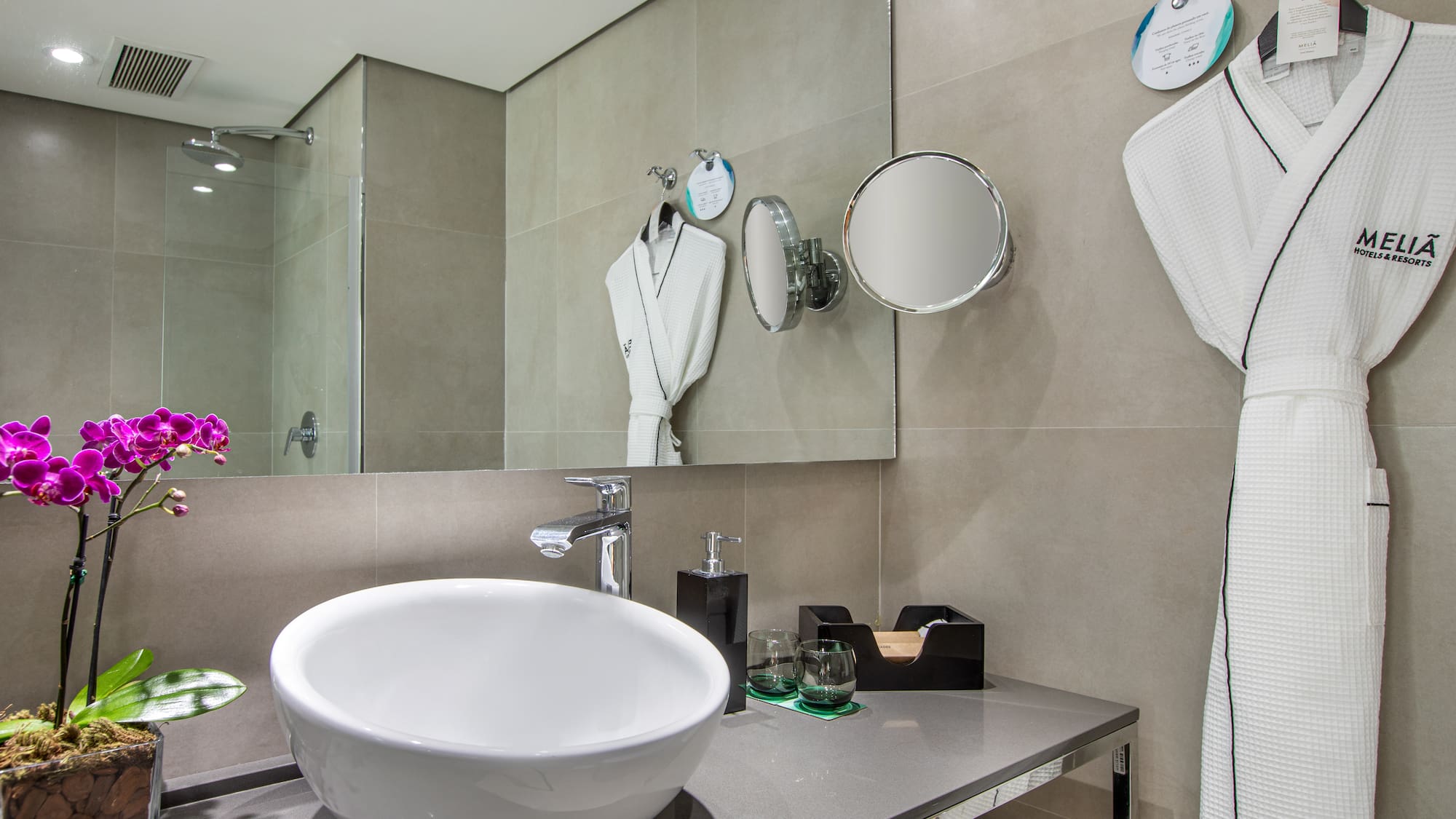 a bathroom with a sink and towels