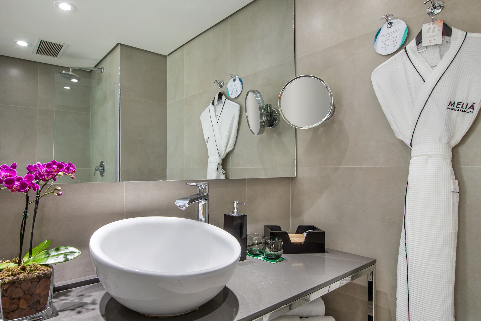 a bathroom with a sink and towels